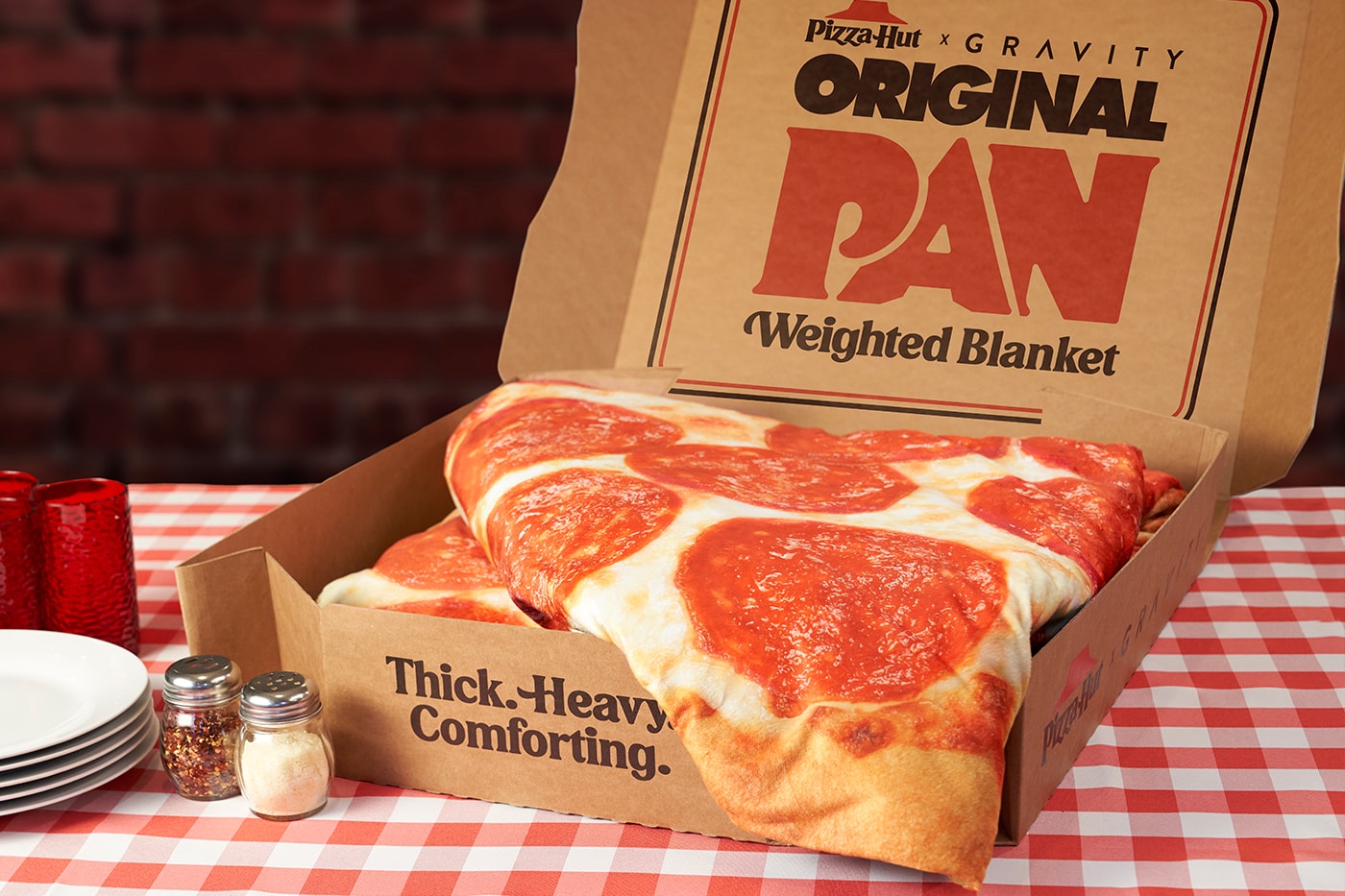 Pizza Hut Drops 15-Pound Original Pan Gravity Blanket  pizza hut foot anxiety sleep warmth Christmas cheese pepperoni 