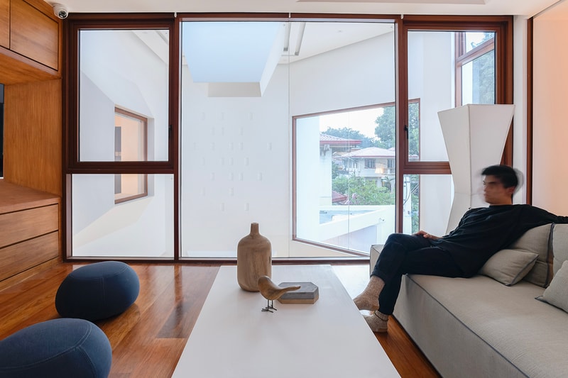 Jim Caumeron Design's VIEWPOINT HOUSE Features Striking Trapezoidal Picture Window Quezon City Philippines Homes Architecture design house minimal 