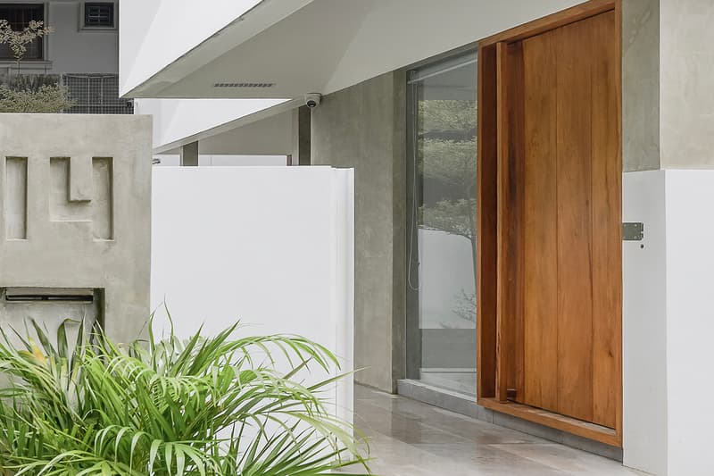 Jim Caumeron Design's VIEWPOINT HOUSE Features Striking Trapezoidal Picture Window Quezon City Philippines Homes Architecture design house minimal