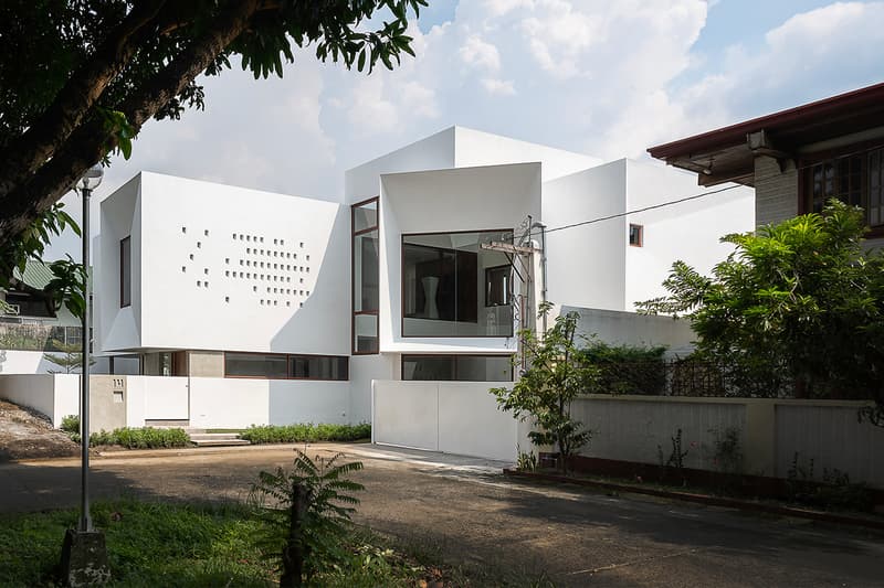 Jim Caumeron Design's VIEWPOINT HOUSE Features Striking Trapezoidal Picture Window Quezon City Philippines Homes Architecture design house minimal 