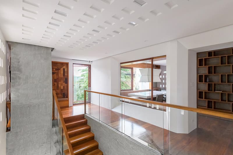 Jim Caumeron Design's VIEWPOINT HOUSE Features Striking Trapezoidal Picture Window Quezon City Philippines Homes Architecture design house minimal