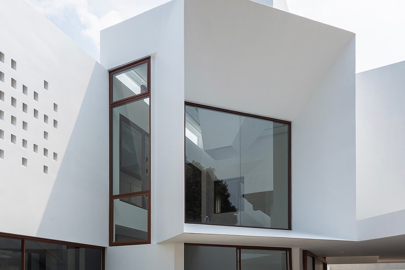 Jim Caumeron Design's VIEWPOINT HOUSE Features Striking Trapezoidal Picture Window Quezon City Philippines Homes Architecture design house minimal 