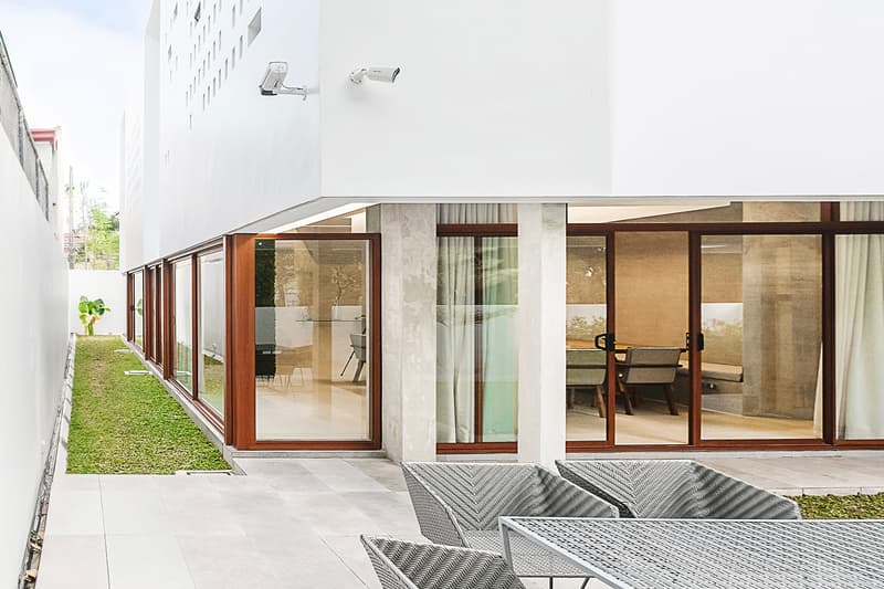 Jim Caumeron Design's VIEWPOINT HOUSE Features Striking Trapezoidal Picture Window Quezon City Philippines Homes Architecture design house minimal
