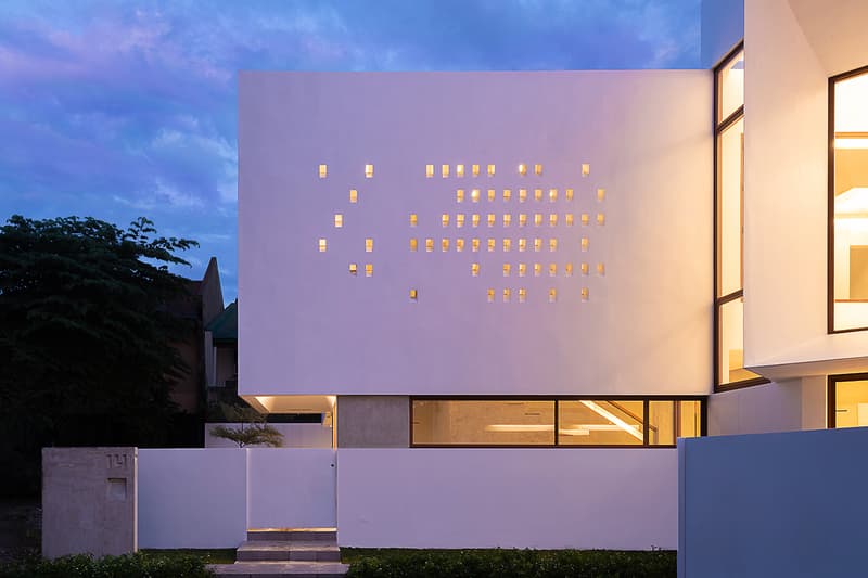 Jim Caumeron Design's VIEWPOINT HOUSE Features Striking Trapezoidal Picture Window Quezon City Philippines Homes Architecture design house minimal