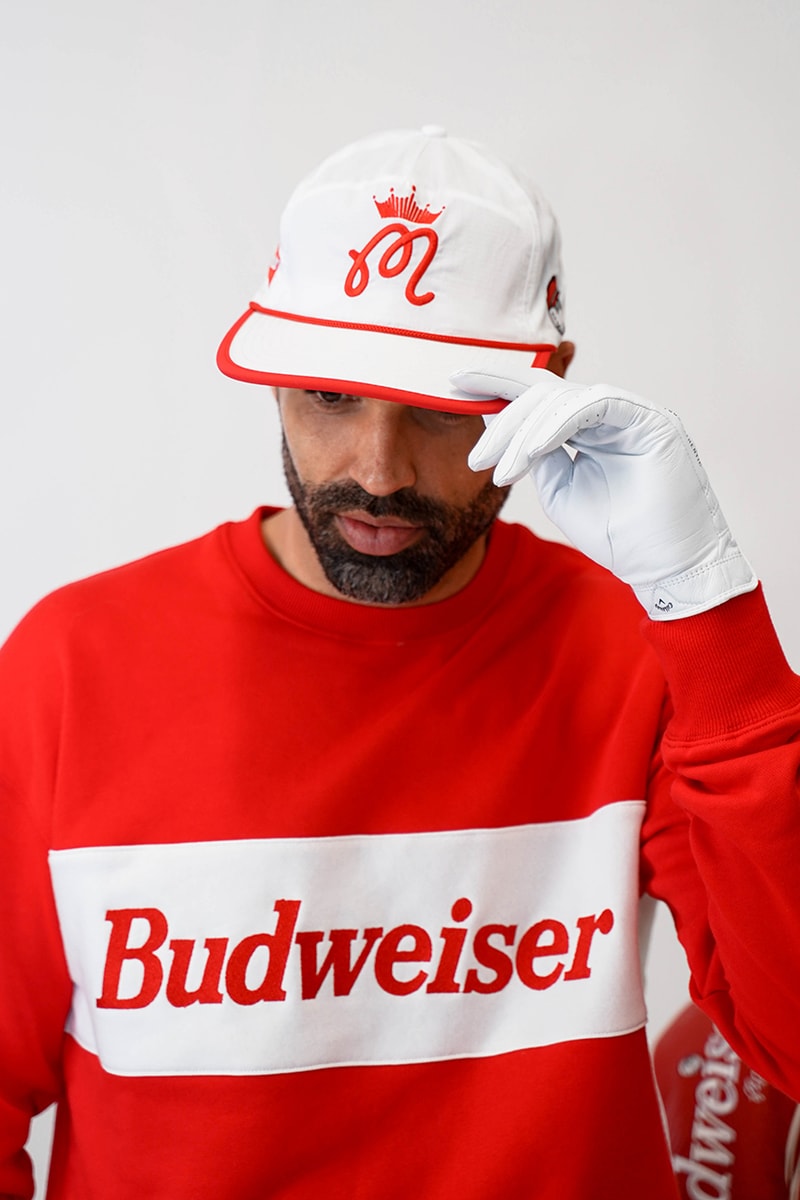 Malbon Golf Launches a Budweiser Collection that consist of a sweatshirt, pants, headcover, golf bag and polo