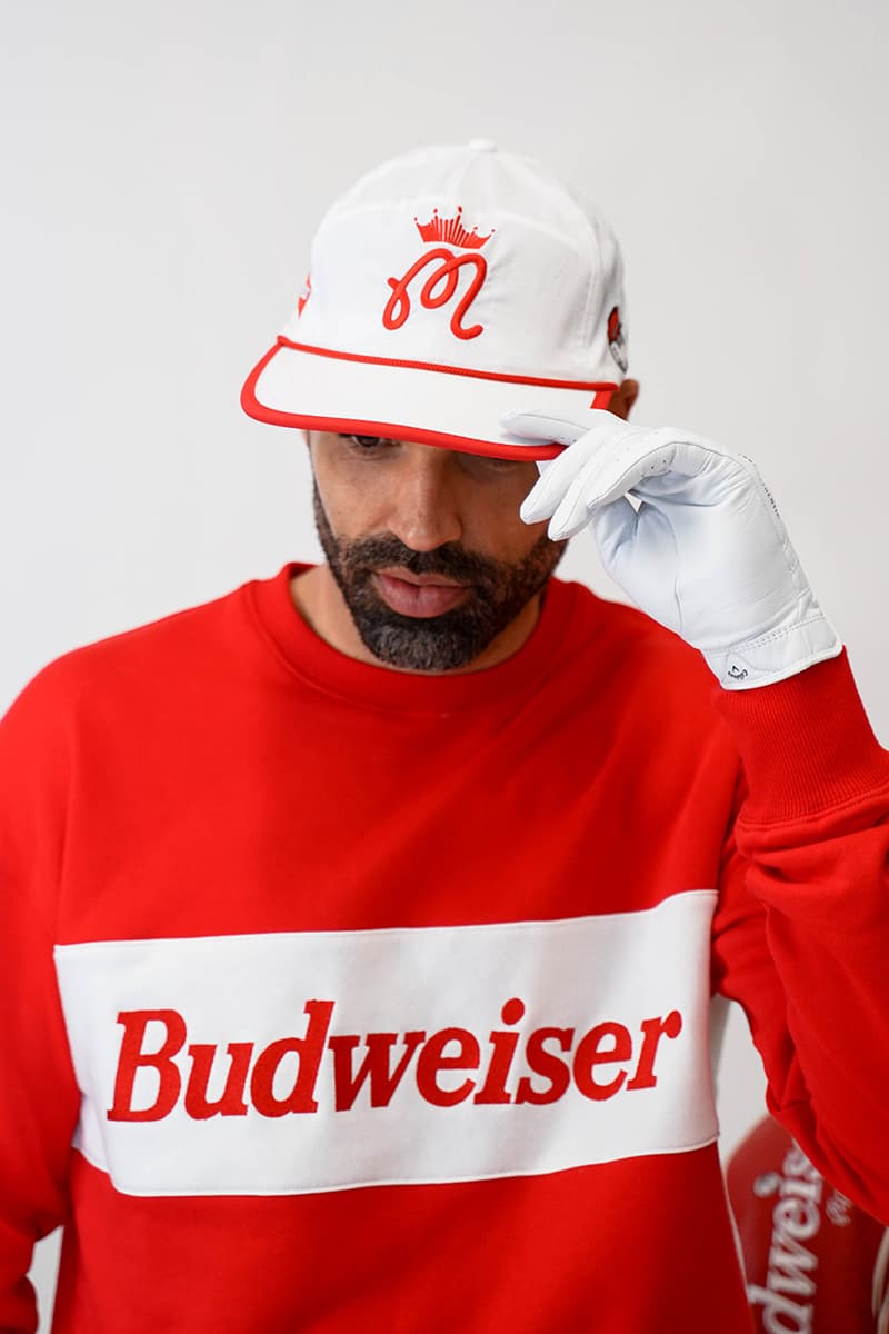 Malbon Golf Launches a Budweiser Collection that consist of a sweatshirt, pants, headcover, golf bag and polo