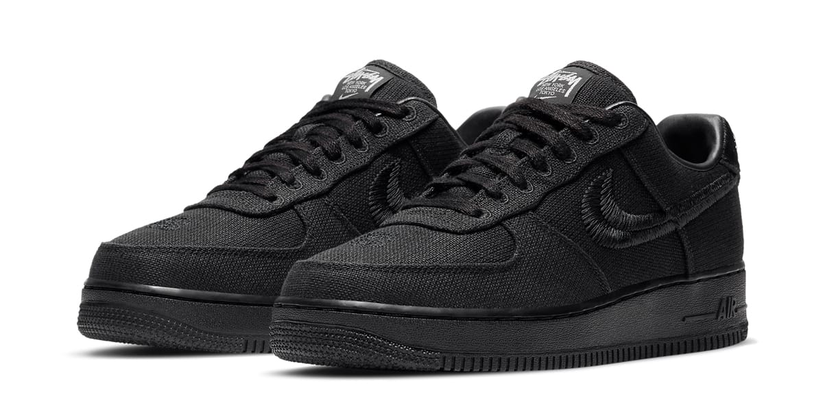 air force 1 with black nike sign