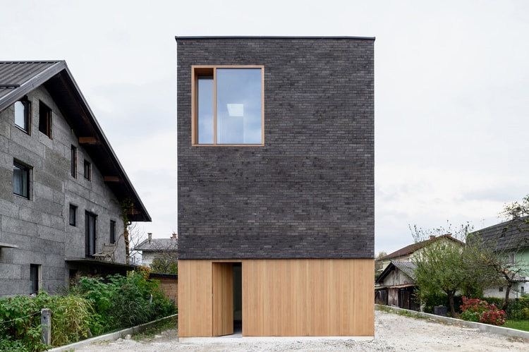 ARHITEKTURA's Double Brick House Anchors Once-Prosperous Slovenian Villa