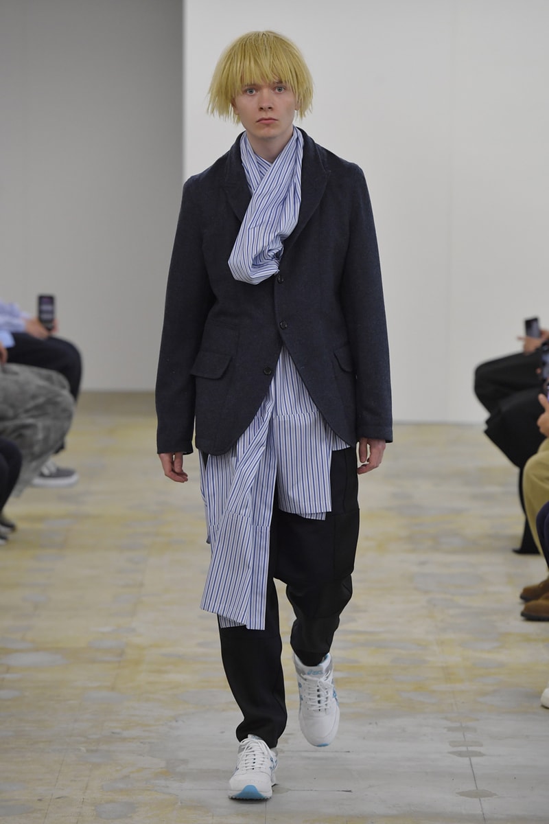 COMME des GARÇONS SHIRT Fall/Winter 2021 KAWS Runway collaboration fw21 collection menswear artist asics tarther sneaker release date info buy japan cdg