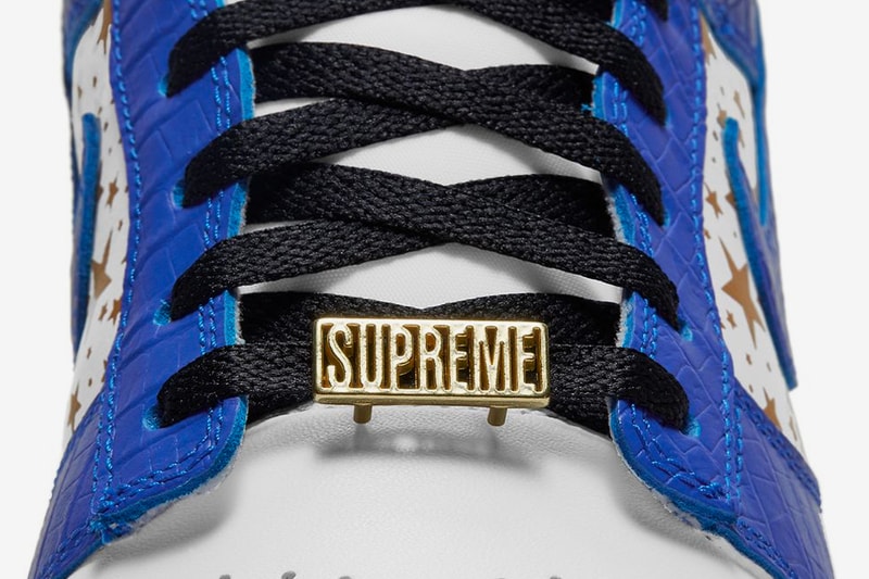 supreme nike sb dunk low white hyper royal metallic gold collaboration release info date photos store list buying guide world famous stars 