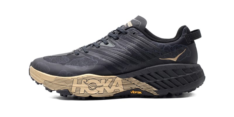 black and gold hoka