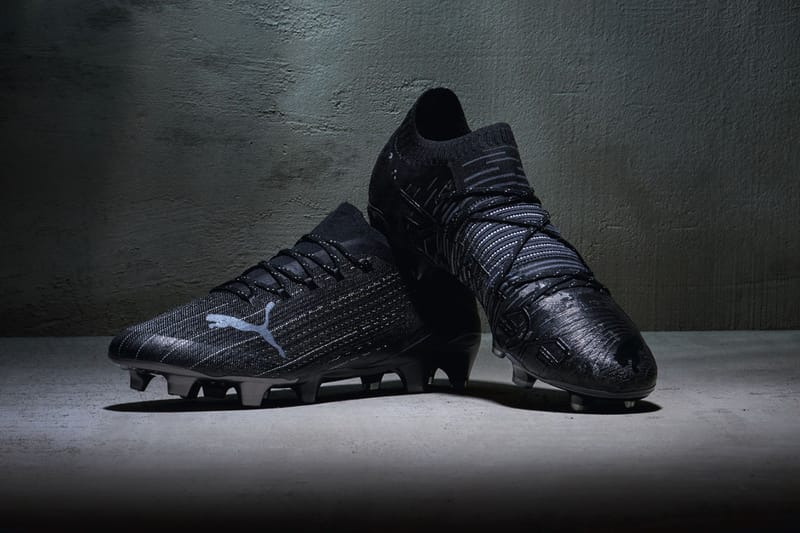 all black puma football boots