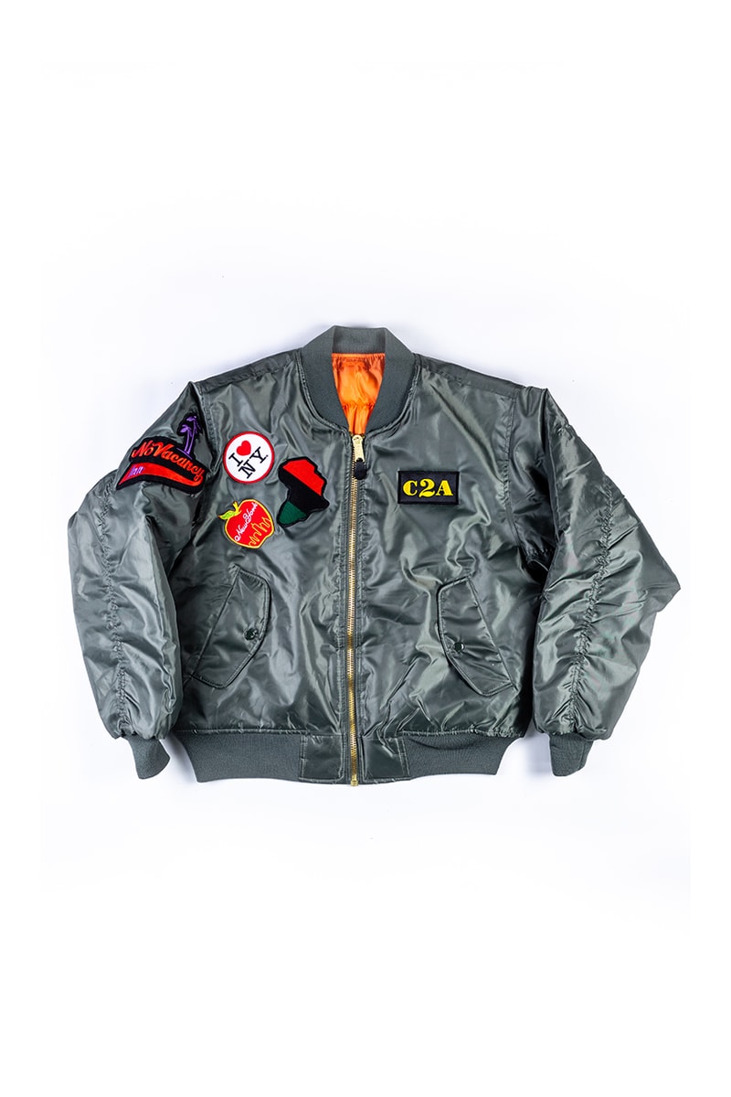 'Coming 2 America' Eddie Murphy Amazon Prime Video Apple AirPods Max Gianni Lee No Vacancy Inn Bomber Jacket L’Enchanteur Jewelry Prince Akeem Promo Material Film Watch Online Stream