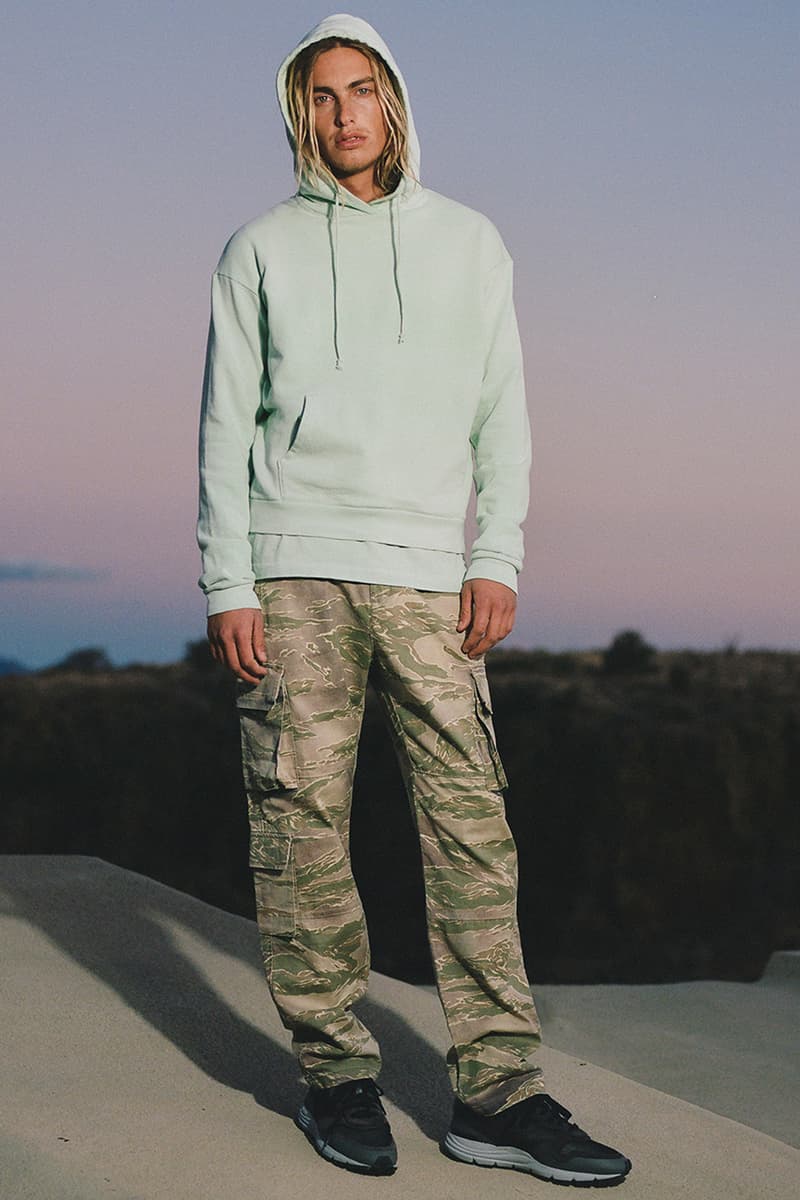 john elliott where the concrete meets the earth ss21 collection release info store list buying guide photos price tiger camo trench hand painted denim fleece edition one runner 