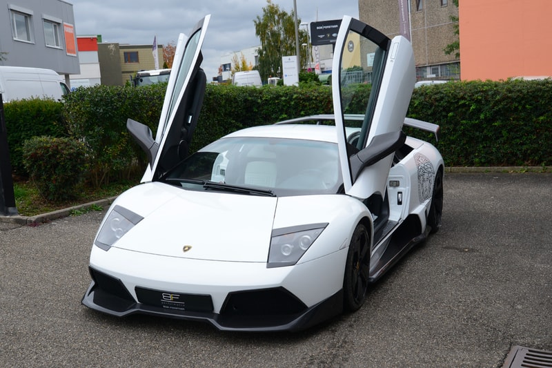 Lamborghini Murcielago 2012 Versace Coupe Bob Forstner Listing gianni versace supercars exotics lambo medusa Italian fashion house horsepower 