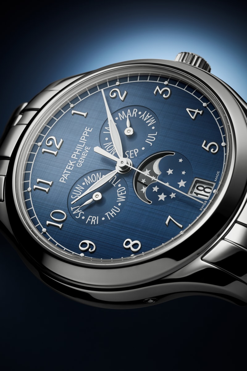 Patek Philippe Drops 4947 Polished Stainless Steel Annual Calendar With Five Link Bracelet and Shantung Dial
