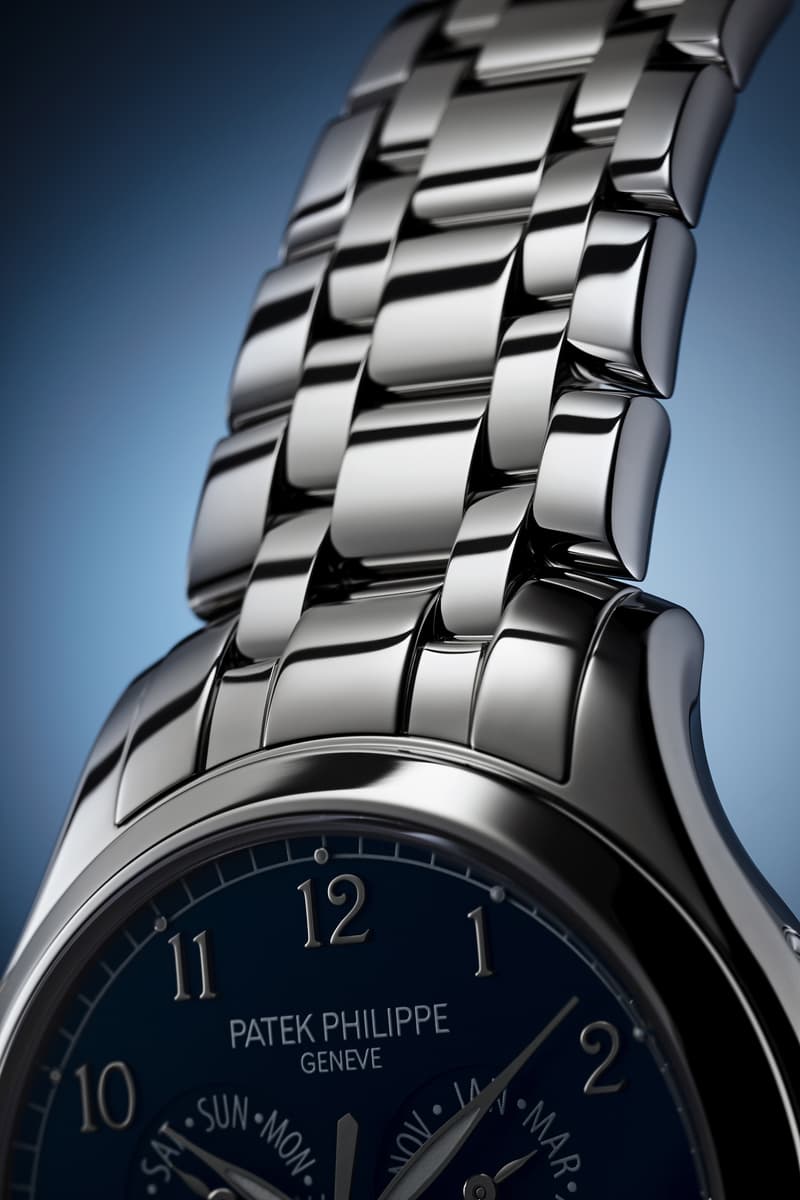 Patek Philippe Drops 4947 Polished Stainless Steel Annual Calendar With Five Link Bracelet and Shantung Dial