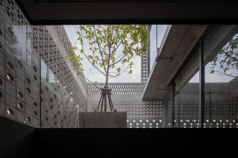 This Home in Thailand Features a Rock Climbing Wall and Light-Filled Brick Facade anonym studio home apartment