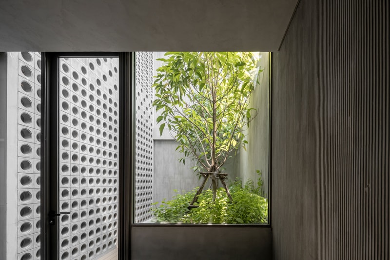 This Home in Thailand Features a Rock Climbing Wall and Light-Filled Brick Facade anonym studio home apartment