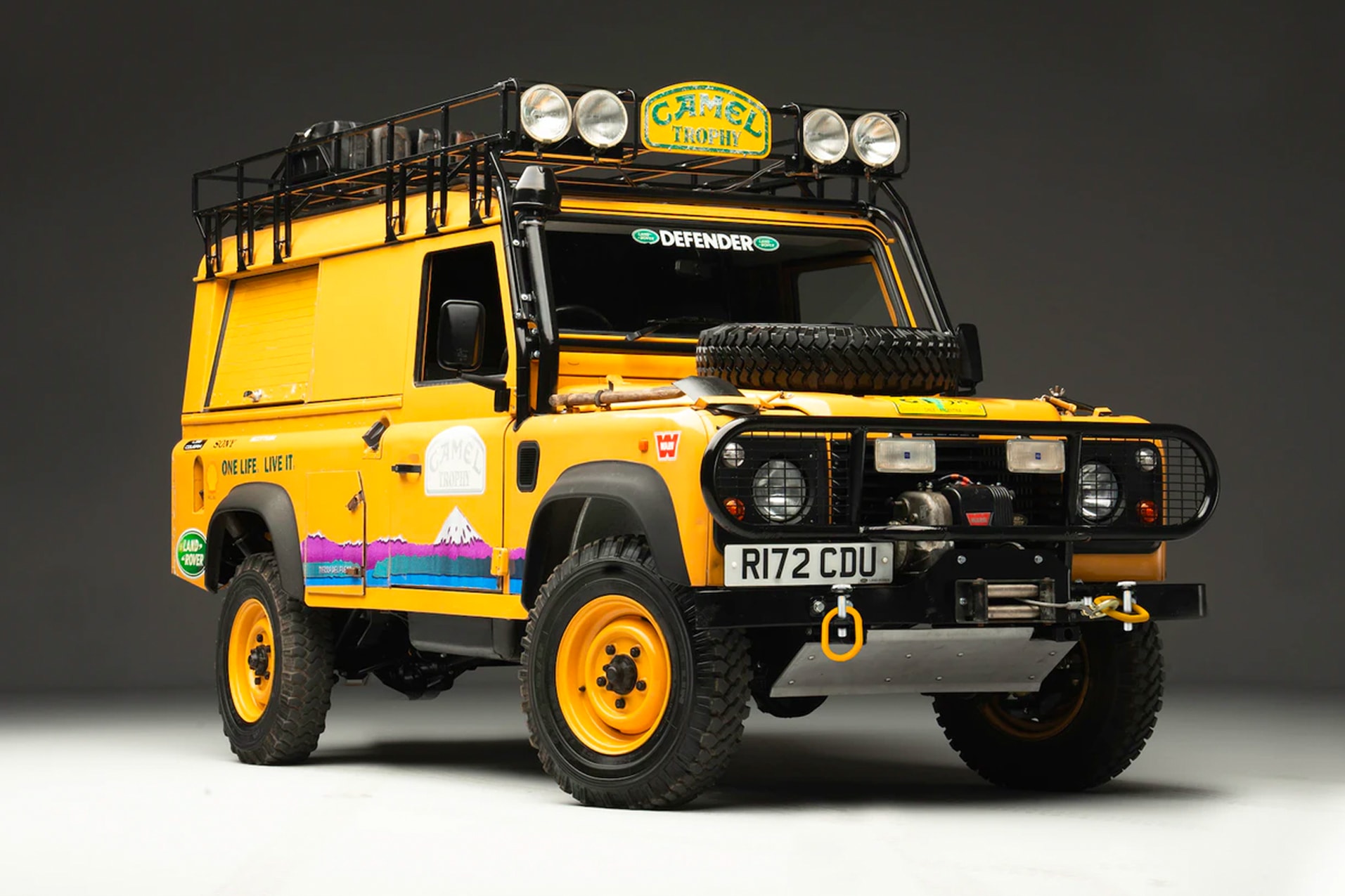collecting cars 1998 LAND ROVER DEFENDER 110 CAMEL TROPHY auction off-roading auctions uk 4x4 cars vintage classic suvs 