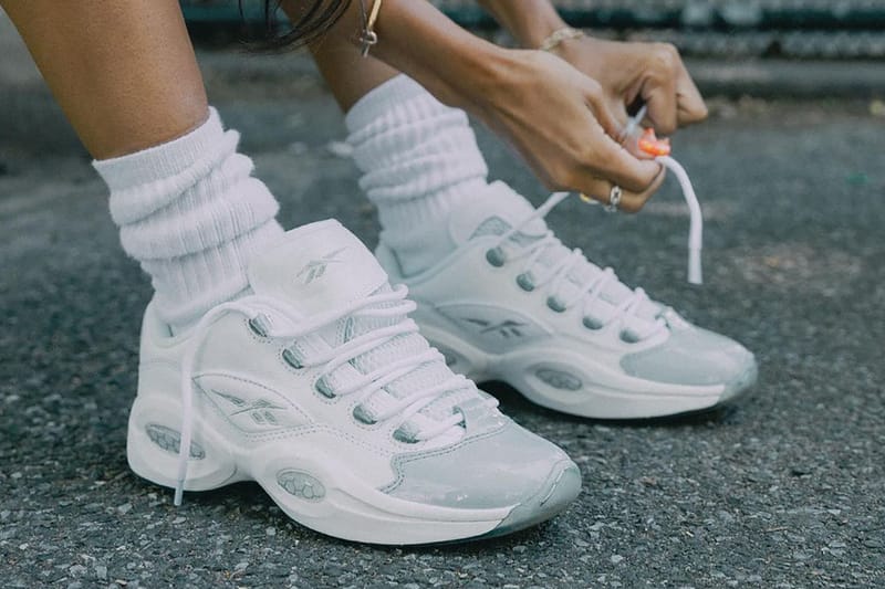 reebok club c double trainers with leopard print detail