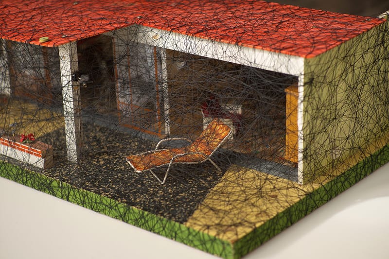 Chiharu Shiota Entraps Miniature Structures in Woven Thread