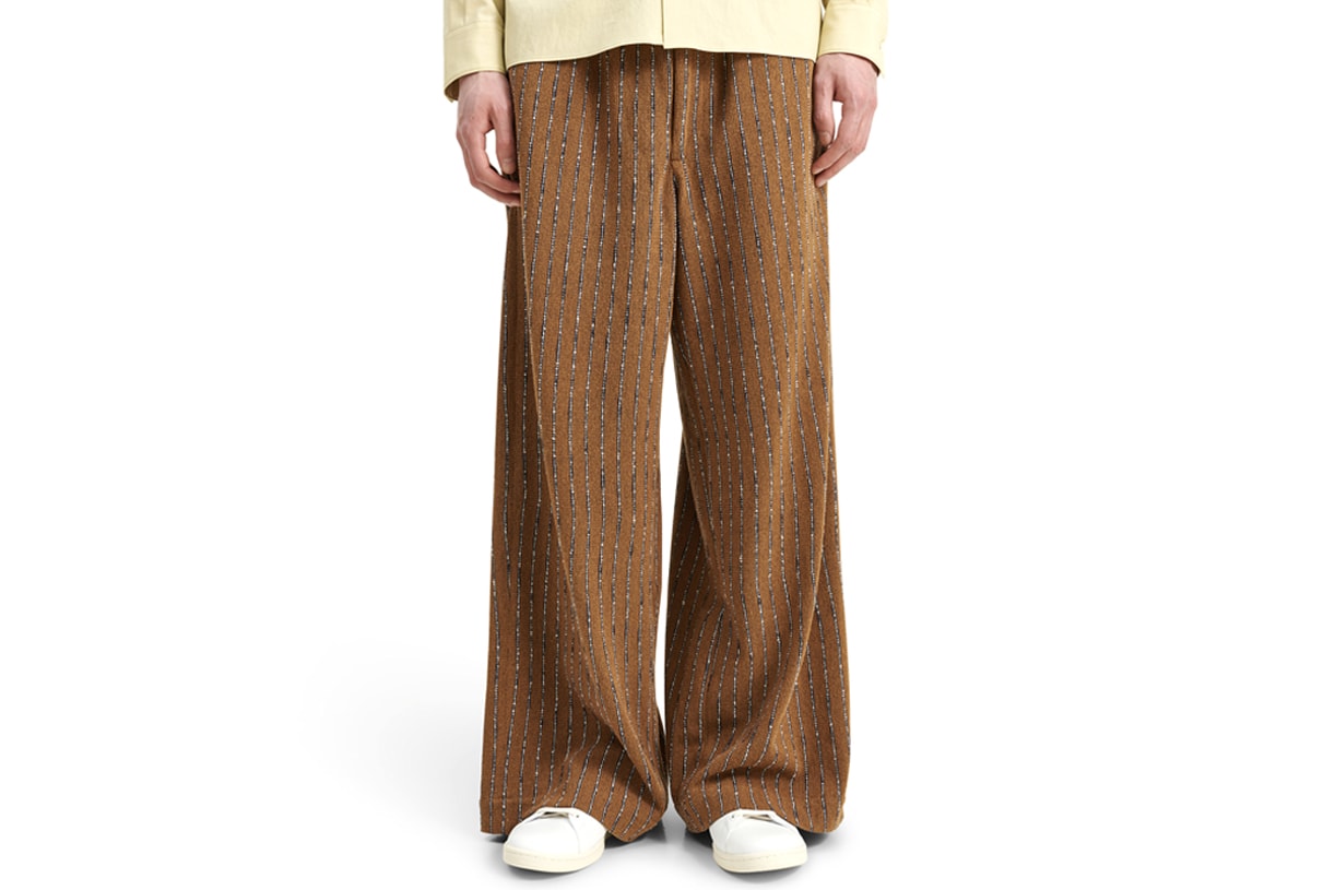 Best Trousers Summer 2021 What to Wear Hot Weather Breezy Wide Leg Floaty Bottoms Pants Bell Bottom Our Legacy Homme Plisse Issey Miyake Designer High Street COS Eckhaus Latta Stone Island Nedews Independent London Brands Acne Studios Eye LOEWE Nature Uniqlo Nike ACG Cottweiler Reebok Luca Magliano