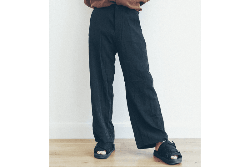 Best Trousers Summer 2021 What to Wear Hot Weather Breezy Wide Leg Floaty Bottoms Pants Bell Bottom Our Legacy Homme Plisse Issey Miyake Designer High Street COS Eckhaus Latta Stone Island Nedews Independent London Brands Acne Studios Eye LOEWE Nature Uniqlo Nike ACG Cottweiler Reebok Luca Magliano