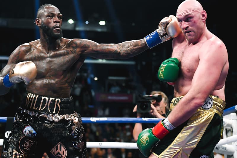 Tyson Fury Deontay Wilder press conference staring contest face off news fight date las vegas gypsy king boxing sports trilogy 