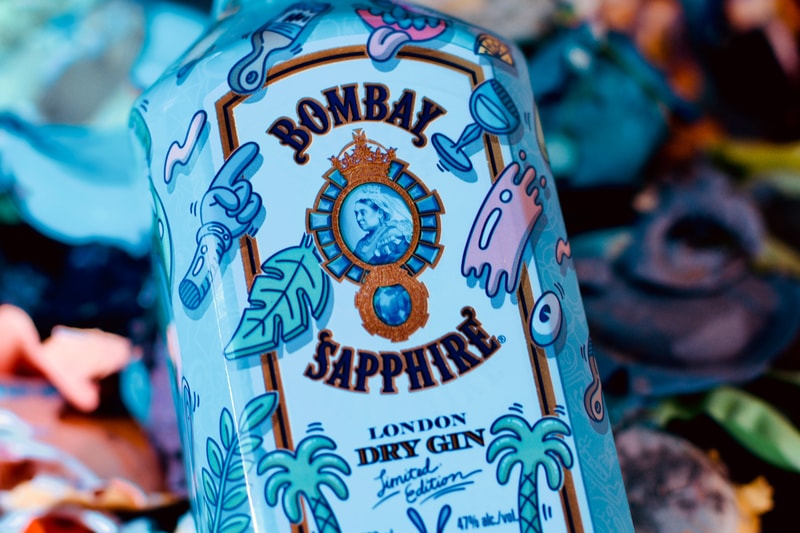 Bombay artist collaboration shoppable lookbook closer look well-infused glass of flavors 10 hand-selected botanicals from exotic locations around the world tongue-in-cheek, inviting graphics and colorful pop latest custom limited-edition lemon peel, almonds for the almond powder and juniper berries playful, vibrant graphics flavor fun Steven Harrington x Bombay Sapphire bottle collaboration $22.99 USD