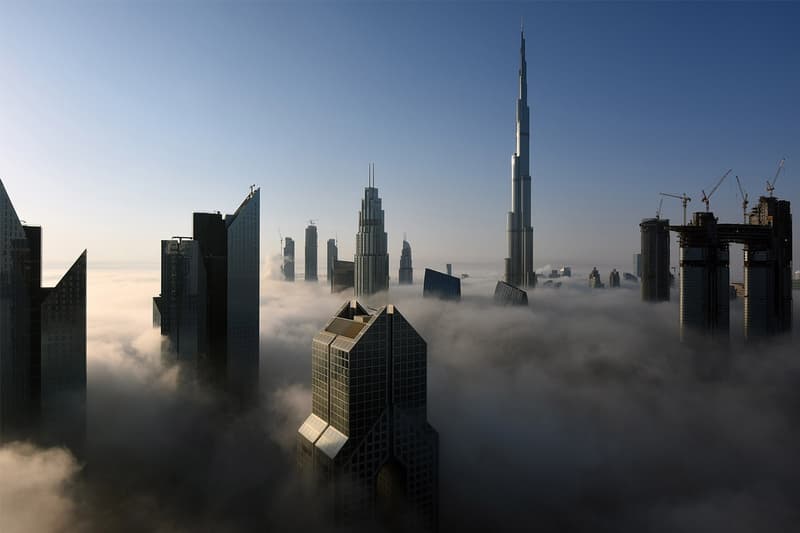 Dubai UAE artificial rain drones electrically charged cloud seeding tech storm aquifers desalination news 