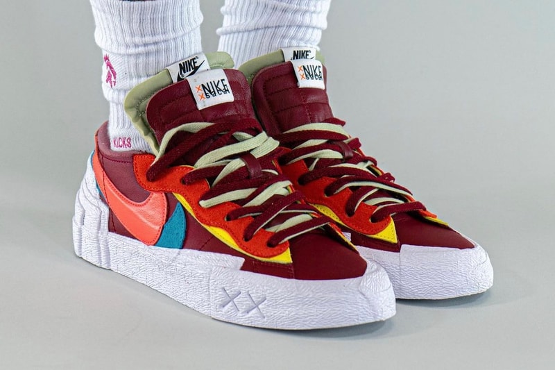 KAWS sacai Nike Blazer Low Another On-Foot Look Release Info DM7901-600 DM7901-40 Red Orange Pink Blue Blue Light Blue Yellow Date Buy Price 