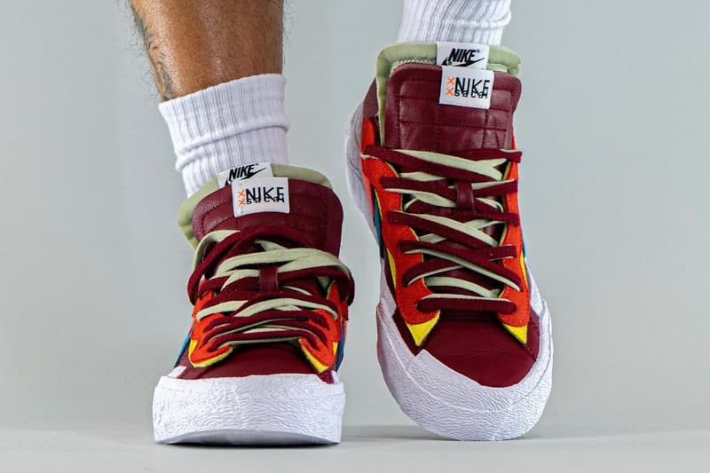 KAWS sacai Nike Blazer Low Another On-Foot Look Release Info DM7901-600 DM7901-40 Red Orange Pink Blue Blue Light Blue Yellow Date Buy Price 