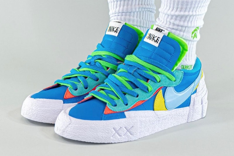 KAWS sacai Nike Blazer Low Another On-Foot Look Release Info DM7901-600 DM7901-40 Red Orange Pink Blue Blue Light Blue Yellow Date Buy Price 