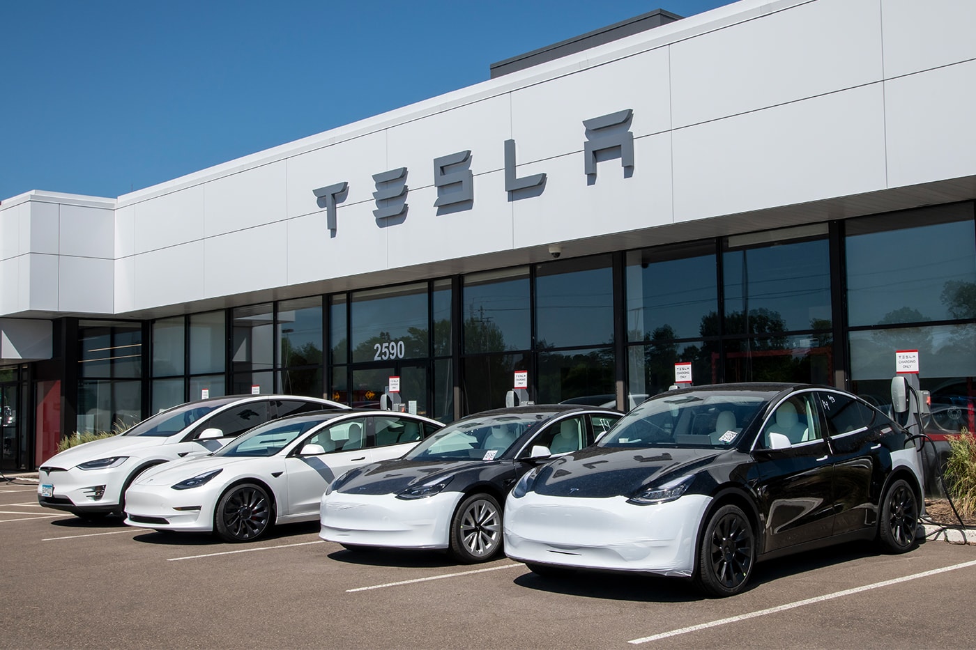 Tesla quarterly profit over one billion usd electric cars elon musk vehicles stocks finance TSLA Model Y X financial report business 