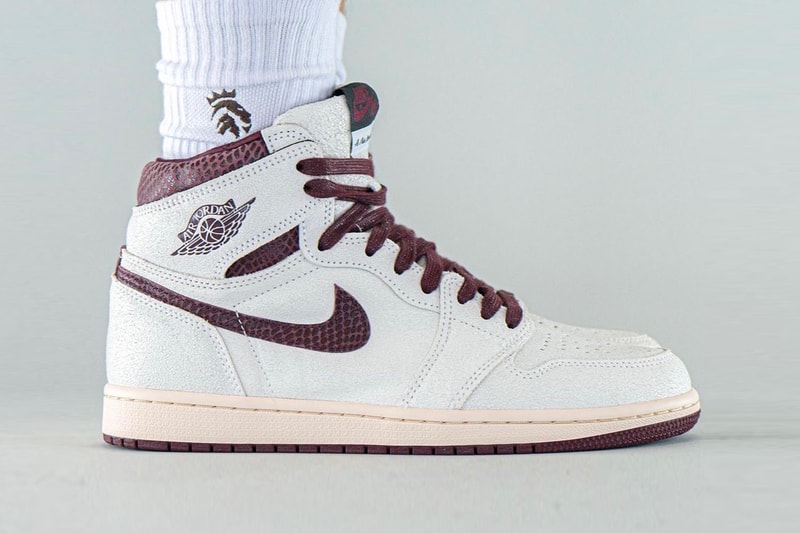 Here's an On-Foot Look at the A Ma Maniére x Air Jordan 1 High OG Raised by  You have to expect things of yourself before you can do them MJ michael jordanwomen sail snakeskin burgundy DO7097-100 Date Buy Price