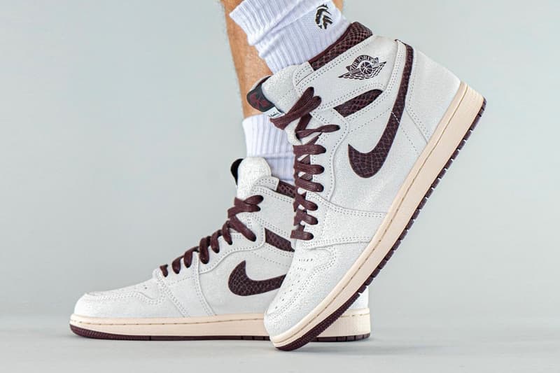 Here's an On-Foot Look at the A Ma Maniére x Air Jordan 1 High OG Raised by  You have to expect things of yourself before you can do them MJ michael jordanwomen sail snakeskin burgundy DO7097-100 Date Buy Price