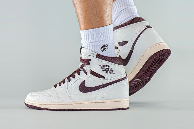 Here's an On-Foot Look at the A Ma Maniére x Air Jordan 1 High OG Raised by  You have to expect things of yourself before you can do them MJ michael jordanwomen sail snakeskin burgundy DO7097-100 Date Buy Price