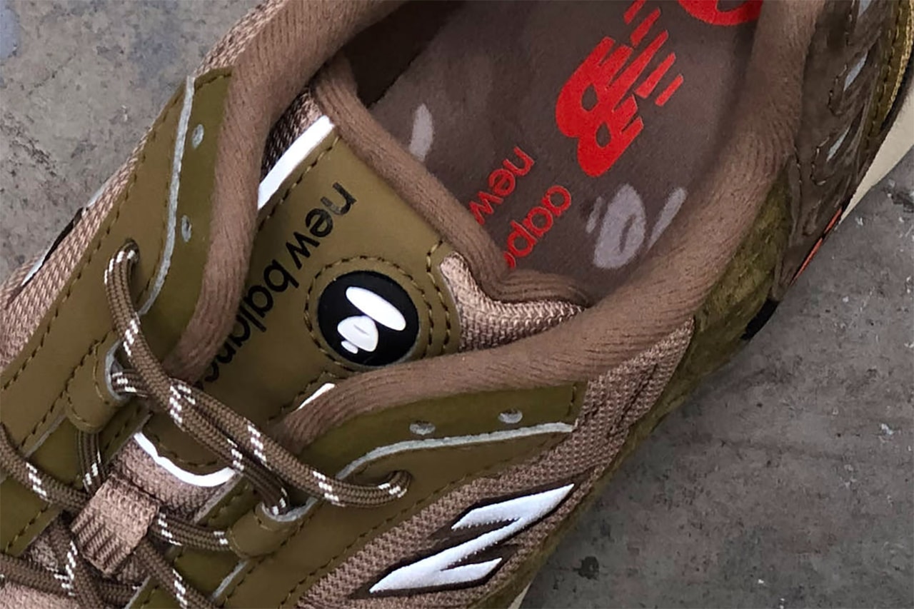 aape new balance 703 black beige olive release date info store list buying guide photos price 
