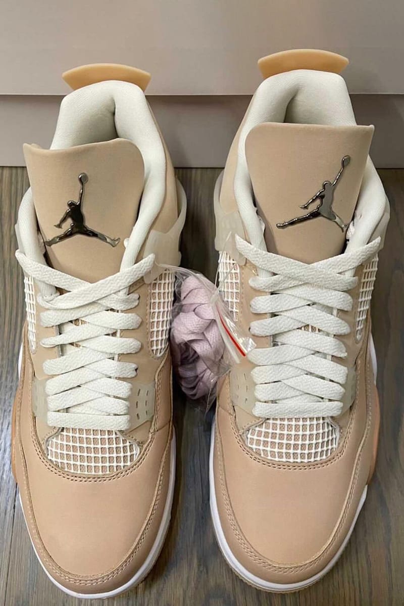 brown and white jordan 4s