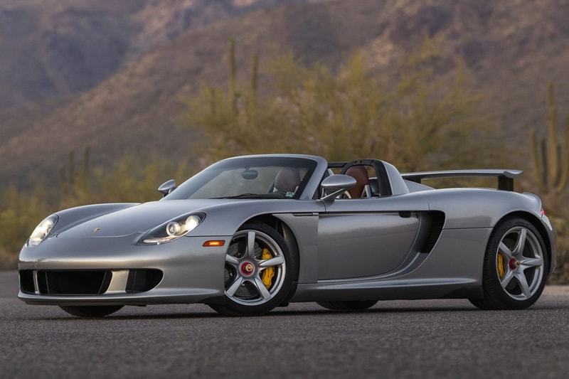 2004 Porsche Carrera GT V10 Silver Metallic Brown Leather Bring a Trailer Auction $1.3M USD For Sale Rare German Supercar Modern Classic