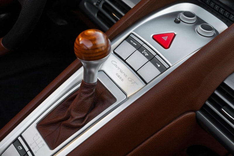 2004 Porsche Carrera GT V10 Silver Metallic Brown Leather Bring a Trailer Auction $1.3M USD For Sale Rare German Supercar Modern Classic