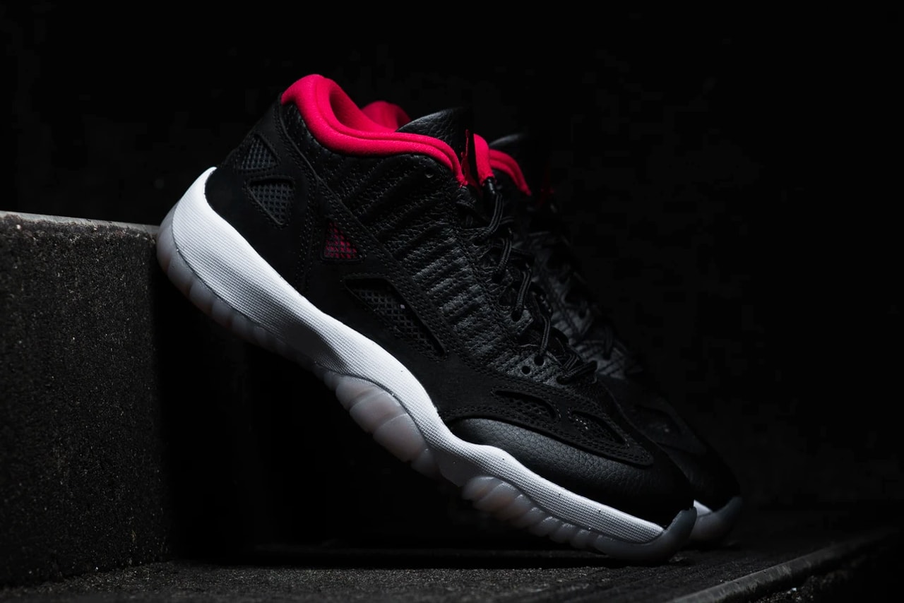 air michael jordan brand 11 low ie bred black red white 919712 023 official release date info photos price store list buying guide