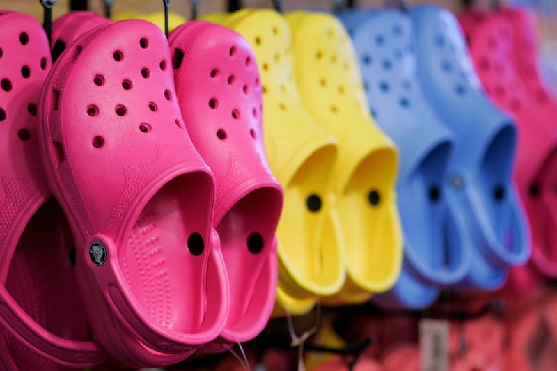 Crocs Unveil Plans To Achieve Over $5 Billion USD in Sales by 2026 footwear clogs sandals plastic shoe balenciaga comfort bright business report sales revenue growth asia china digital