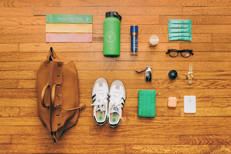 Essentials emily oberg luxury health club sporty and rich Hermes Birkin chanel resistance band glasses water bottle Hypebeast