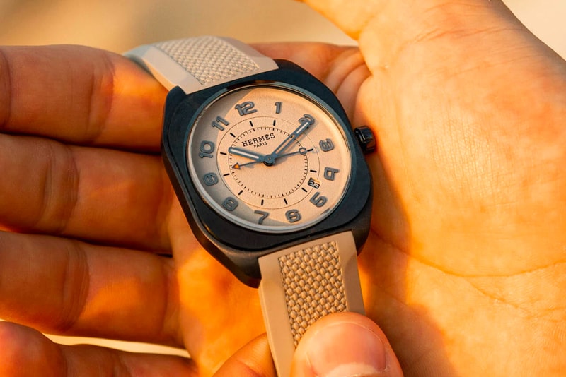 HODINKEE and Hermès Introduce the Ideal Daily Driver Watch watches and wonders h08 timepiece series collection H monogram fabric silicone cement arrow shaped signature orange release 7275 USD cushion shaped info