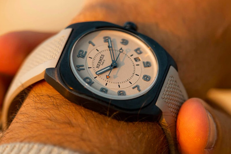 HODINKEE and Hermès Introduce the Ideal Daily Driver Watch watches and wonders h08 timepiece series collection H monogram fabric silicone cement arrow shaped signature orange release 7275 USD cushion shaped info