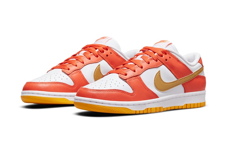 This Nike Dunk Low Mixes Orange Overlays With Gilded Swooshes