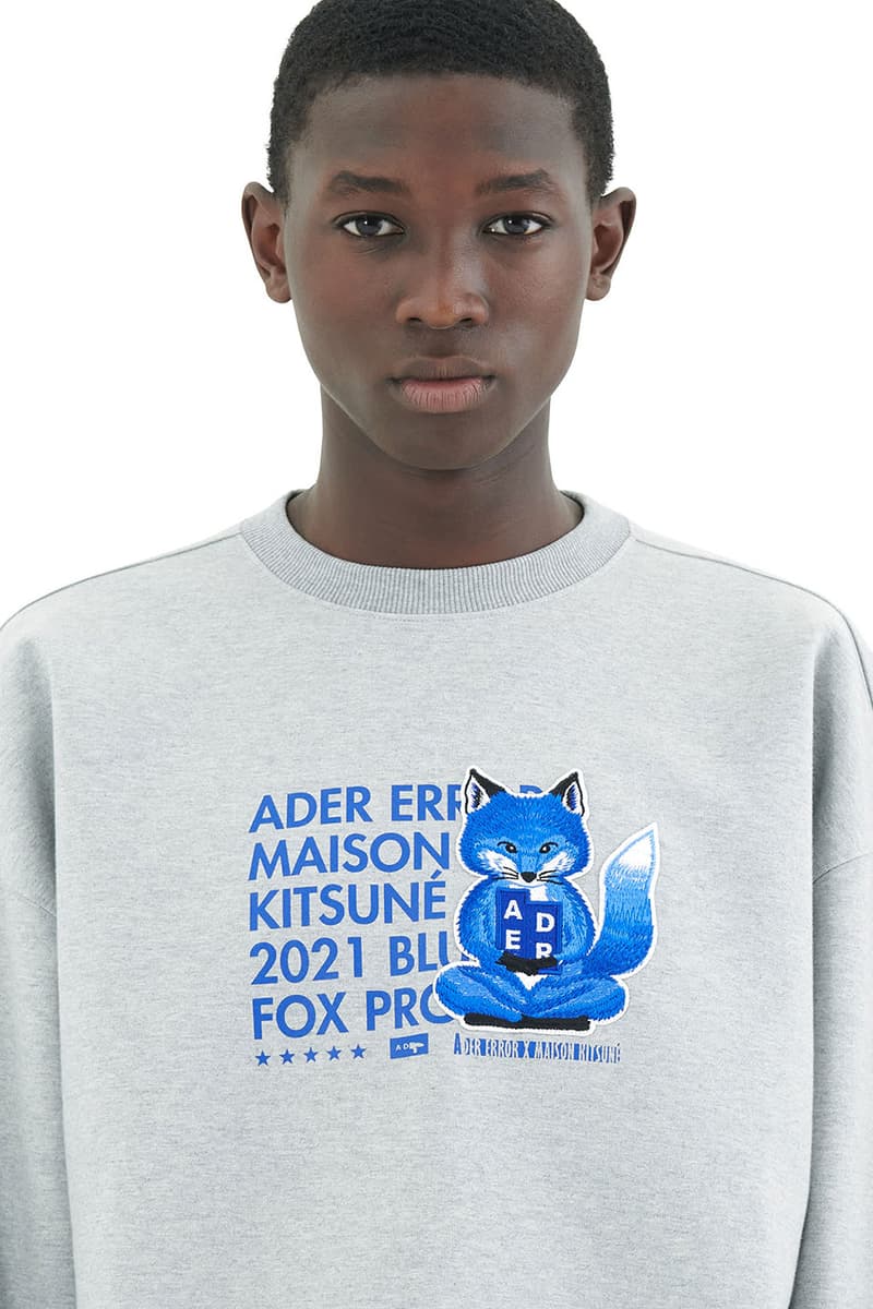 ader error maison kitsune blue fox lazy stretching yawning t shirts sweatshirts hoodies cap collaboration collection logo misplaced tag detailing paris tokyo korea