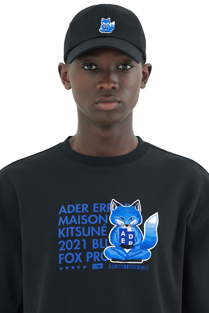 ader error maison kitsune blue fox lazy stretching yawning t shirts sweatshirts hoodies cap collaboration collection logo misplaced tag detailing paris tokyo korea